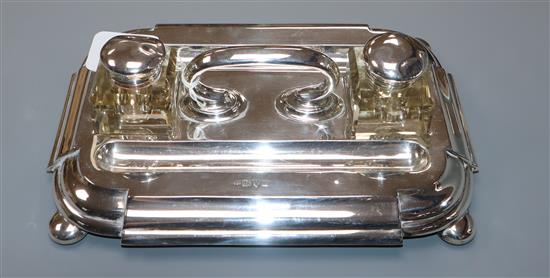 An Edwardian silver inkstand, Barker Brothers, Chester, 1906, (wells a.f.) 16 oz.